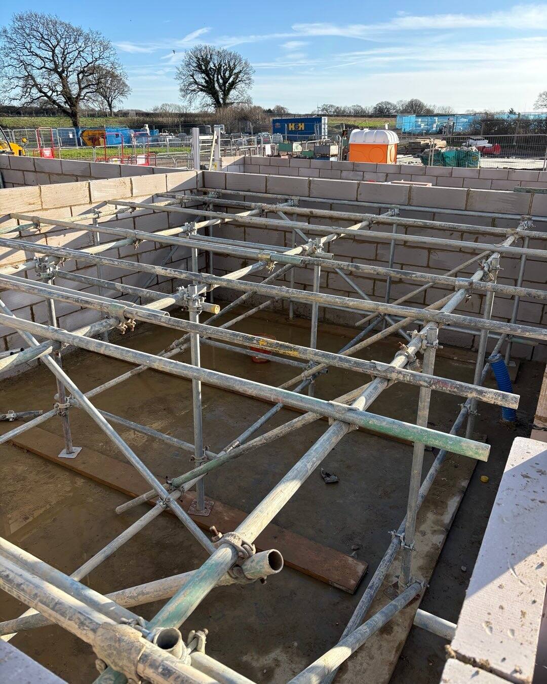 Birdcage scaffold structure built inside a basement excavation
